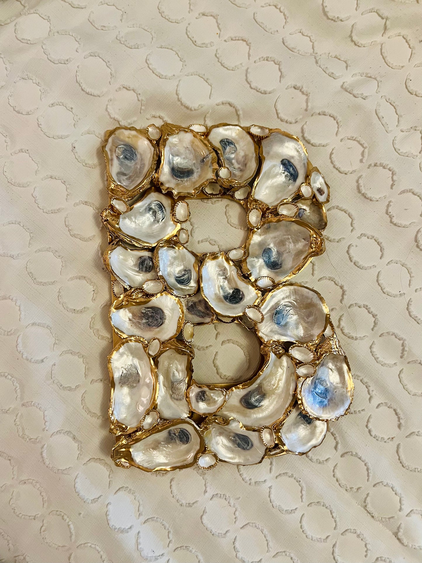 Oyster Shell Initial